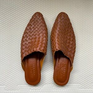 Brown leather slides. Never worn. Size 40, fits size 8.5 US
